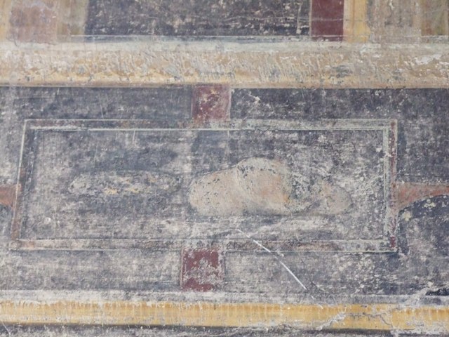 VI.15.6 Pompeii. March 2009. Room 15, painted panel in upper area on north wall of triclinium.