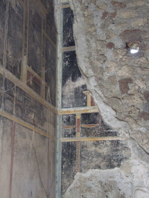 VI.15.6 Pompeii. March 2009. Room 15, east wall of triclinium, and north-east corner.