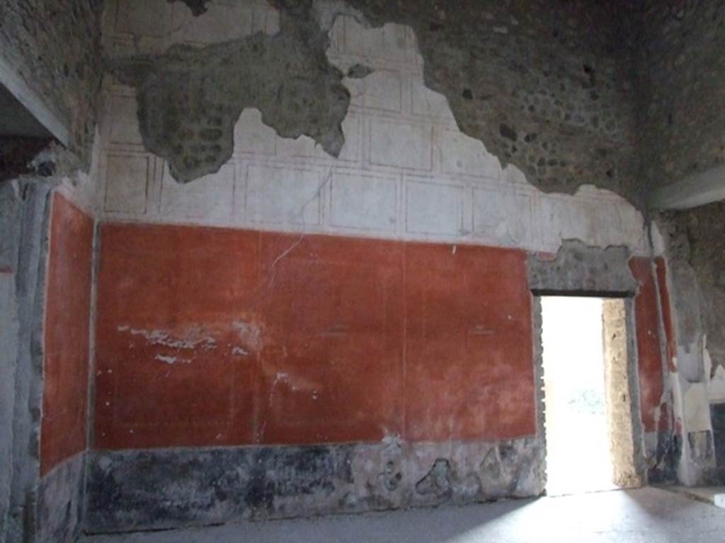 VI.15.8 Pompeii. December 2007. South wall of atrium with doorway to portico.