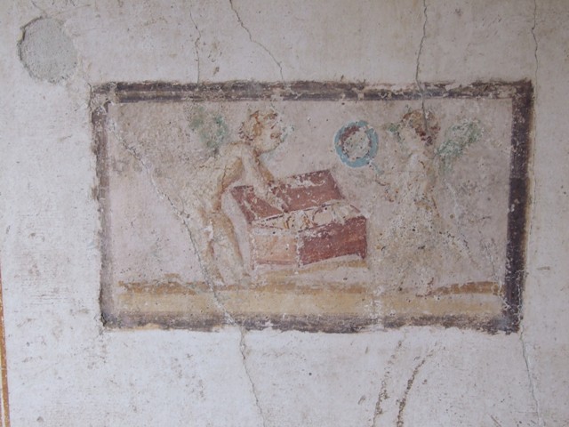 VI.15.8 Pompeii. May 2015. Detail of stucco on upper west side of centre of south wall.  Photo courtesy of Buzz Ferebee.
