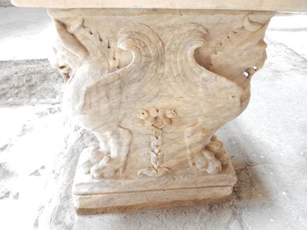 VI.15.8 Pompeii. May 2015. Looking towards decorative east side of marble table. 
Photo courtesy of Buzz Ferebee.
