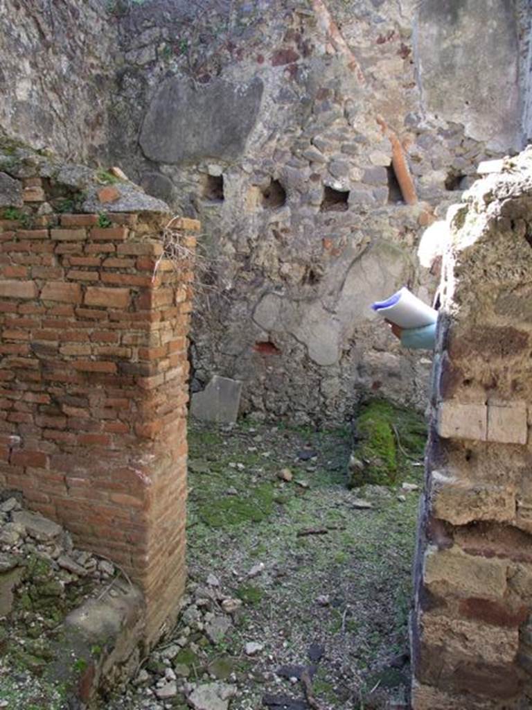 VI.15.9 Pompeii.  March 2009.  Kitchen area, doorway through to kitchen and latrine. Looking west.