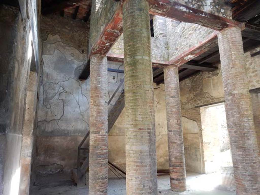 VI.15.9 Pompeii. March 2009. South wall of atrium, in south-east corner, with reconstructed modern staircase.