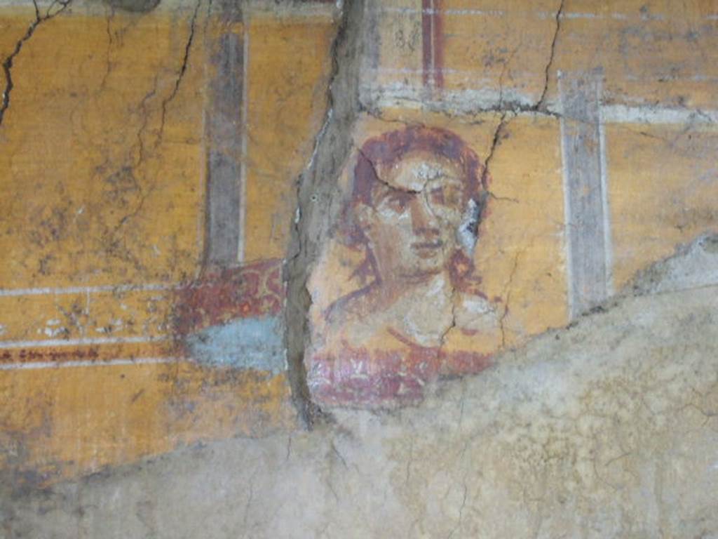 VI.16.7 Pompeii. May 2006. Room N, painting of face on east end of north wall.