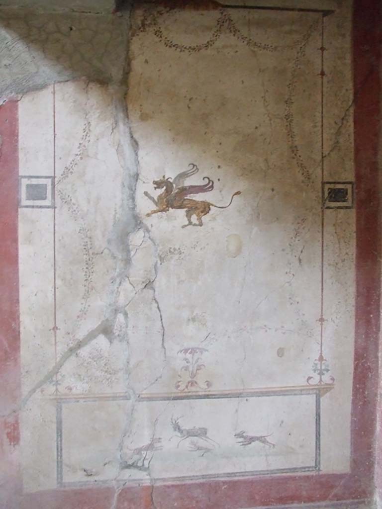 VI.16.15 Pompeii. December 2006. South wall of small tablinum D. Painting of winged creature.