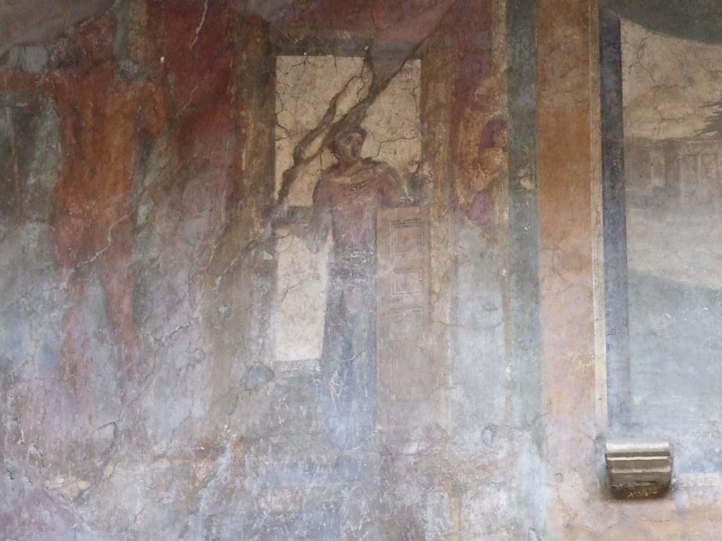 VI.16.15 Pompeii. December 2006. South end of upper west wall of atrium B above room D. 
Detail of wall painting of statue of Poseidon left and woman with patera, making an offering.
