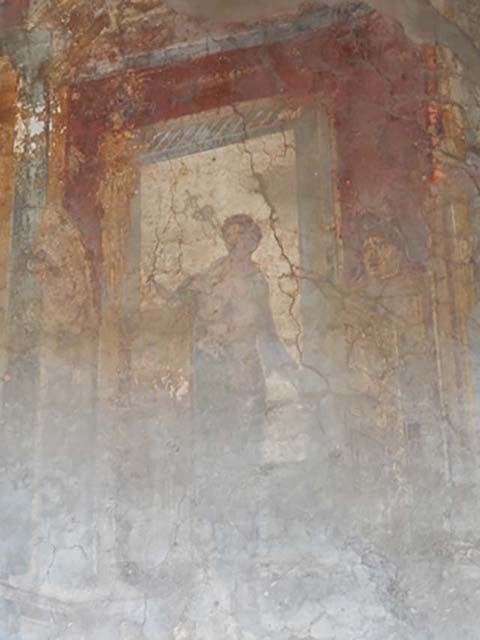 VI.16.15 Pompeii. December 2006. South end of upper west wall of atrium B above room D. Detail of wall painting of statue of Poseidon left and woman with patera, making an offering.