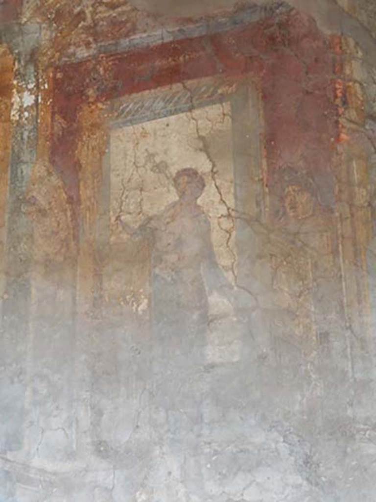 VI.16.15 Pompeii. May 2015. North end of upper west wall of atrium B above room E. 
Detail of wall painting of woman with patera, making an offering to the statue of Nike. Photo courtesy of Buzz Ferebee.
