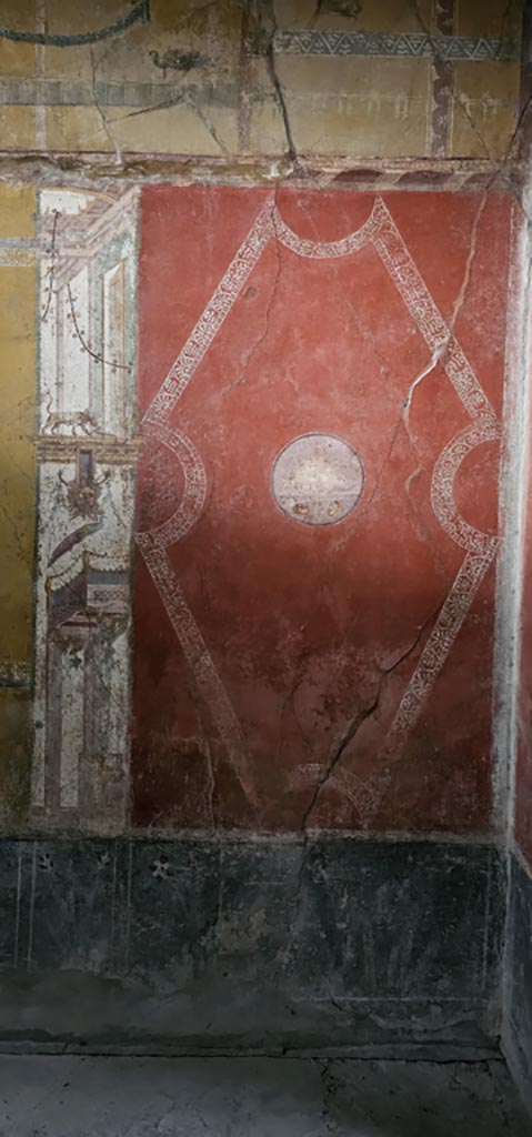VI.16.15 Pompeii. December 2006. North end of west wall of room F. Architectural wall painting with panther, mask and peacock.
