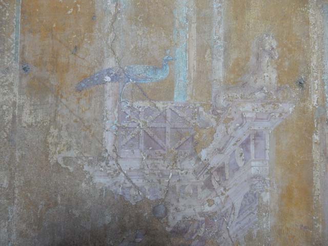 VI.16.15 Pompeii. May 2015. Room G, detail of wall decoration from west side of central painting on north wall. Photo courtesy of Buzz Ferebee.
