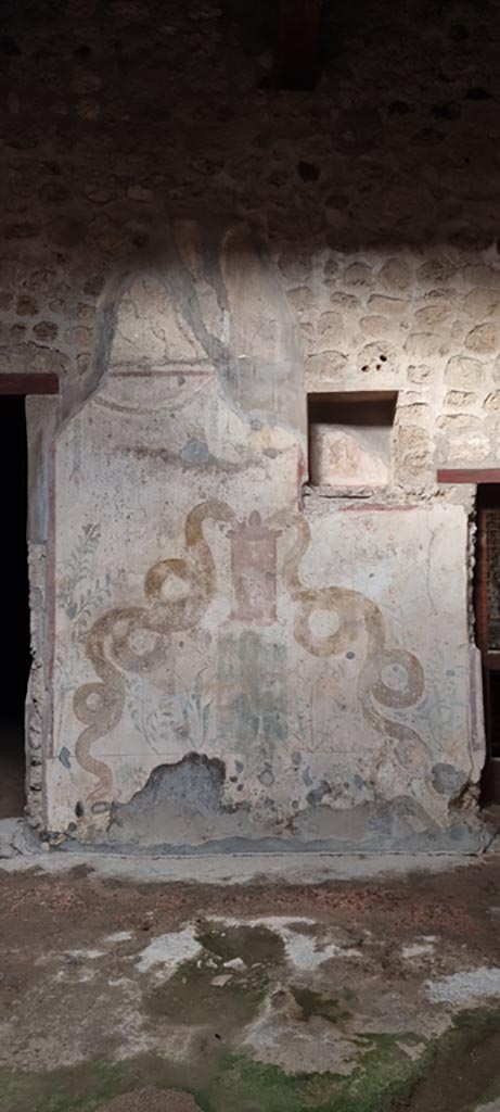 VI.16.15 Pompeii. December 2023.
Lararium on north wall of atrium. Photo courtesy of Miriam Colomer.
