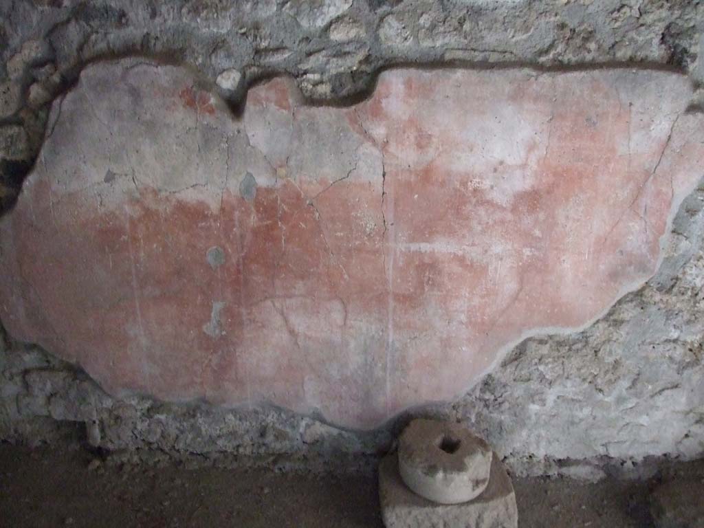 VI.16.15 Pompeii. December 2006. Room I on north side of atrium. Red plaster on lower east wall.