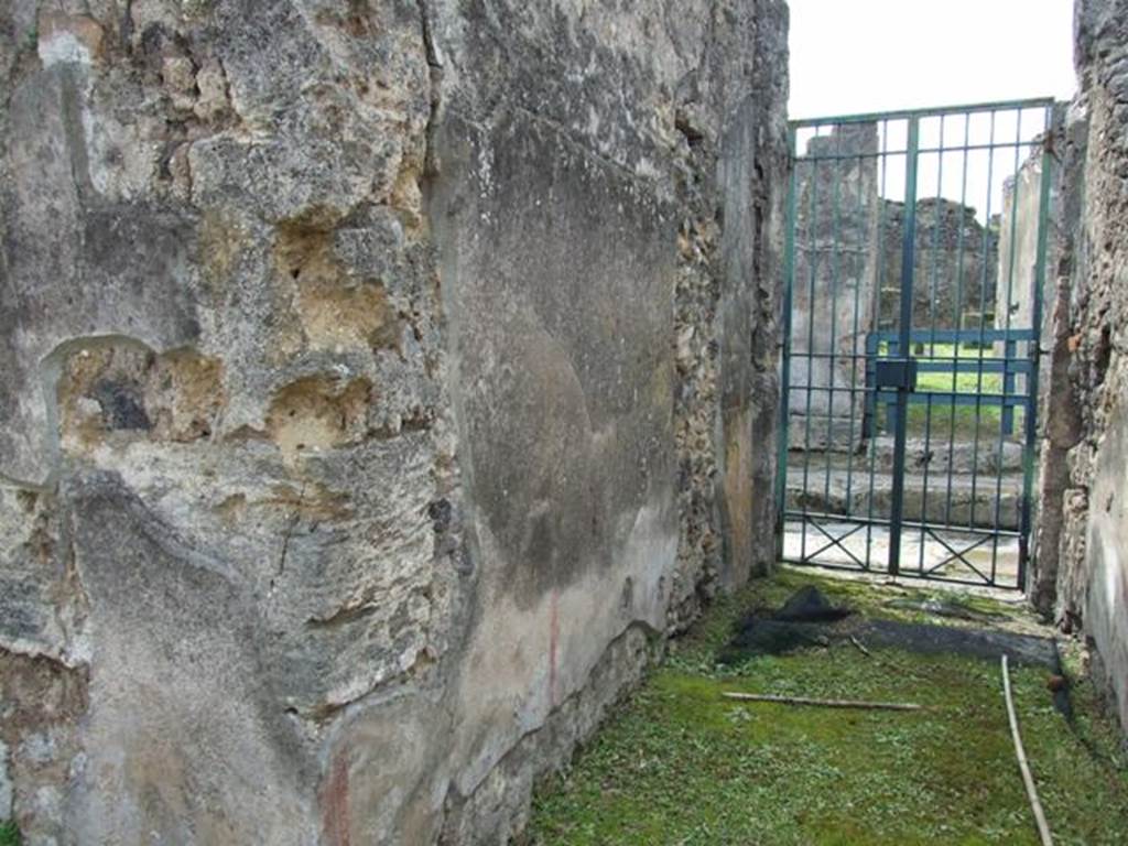 VI.16.27 Pompeii. March 2009. Room A, south wall of fauces, looking slightly downhill towards Vicolo dei Vettii.