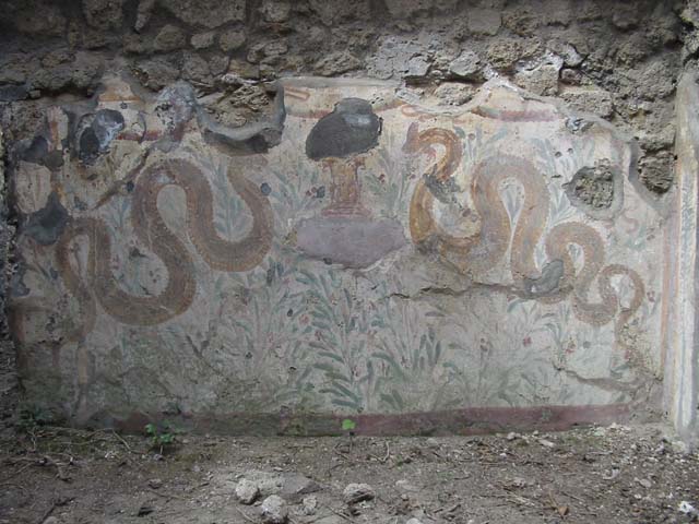 VI.16.40 Pompeii. May 2003. Lararium on west wall. Photo courtesy of Nicolas Monteix.