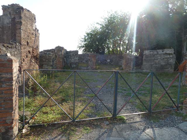 VI.17.1 Pompeii. September 2015. Looking west to entrance doorway from Via Consolare.
