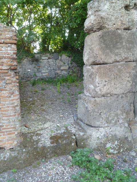 VI.17.1 Pompeii. May 2011. Looking east from room in north-west corner towards entrance doorway.