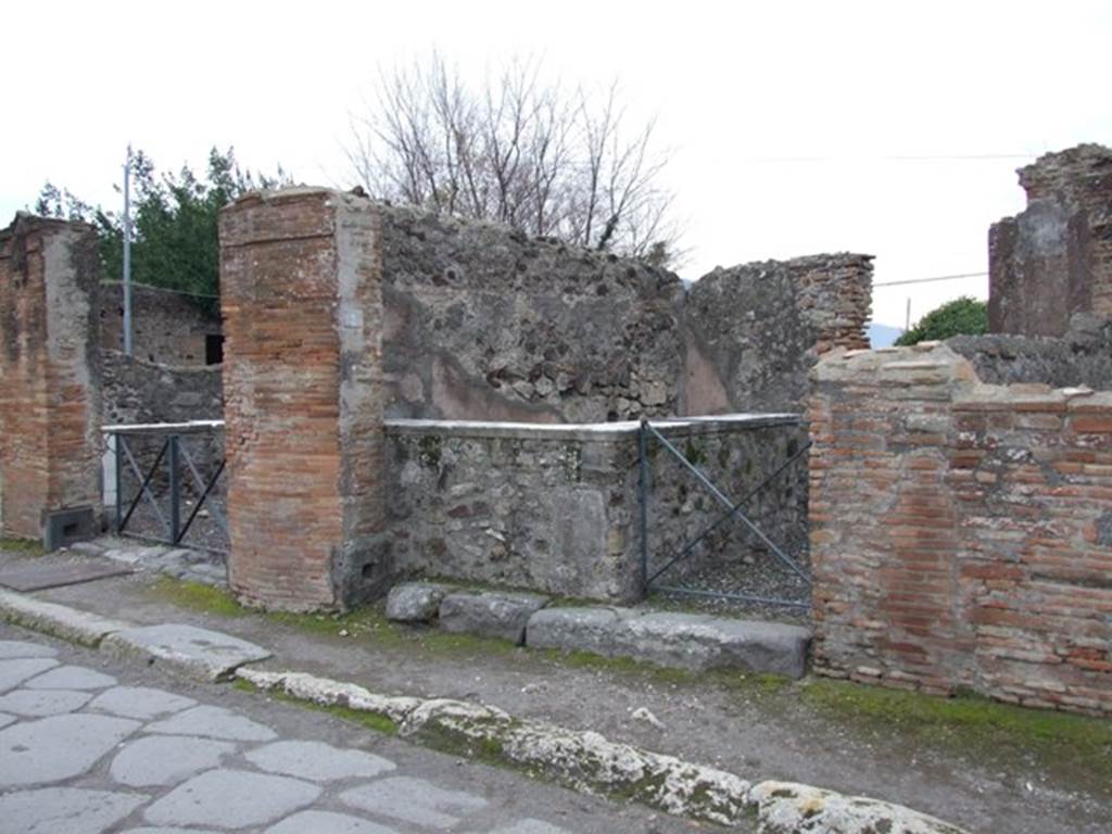 VI.17.2 Pompeii. December 2007. Entrance doorway on west side of Via Consolare.