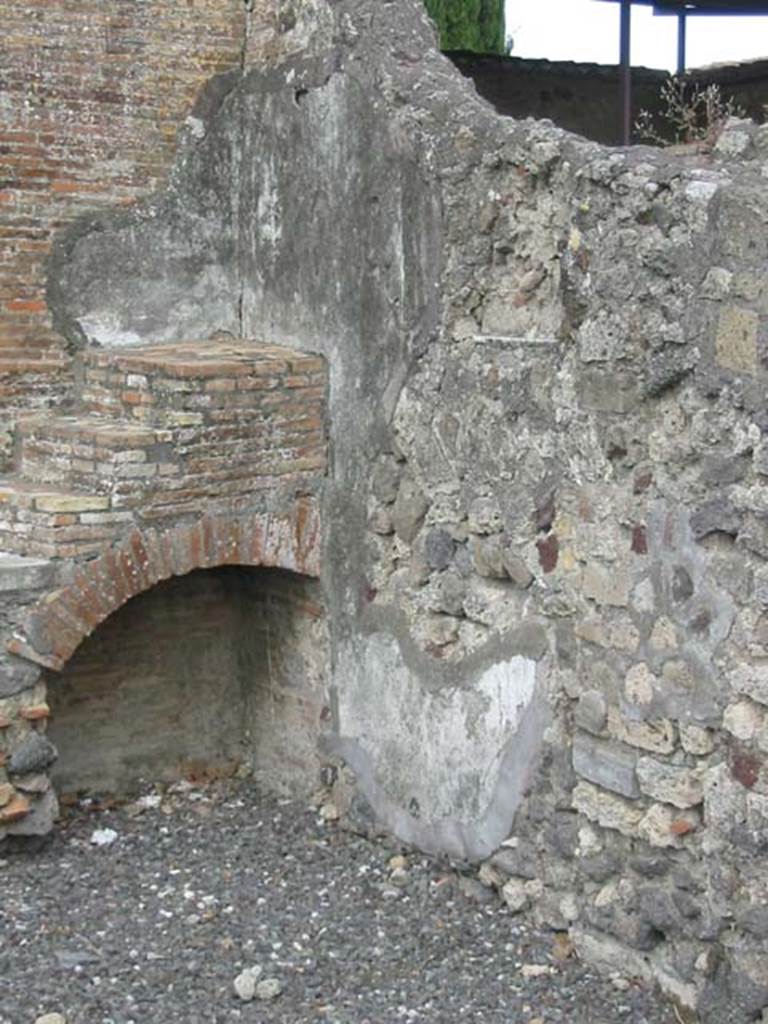 VI.17.4 Pompeii. May 2011. South-east corner of bar-room, with display shelving.