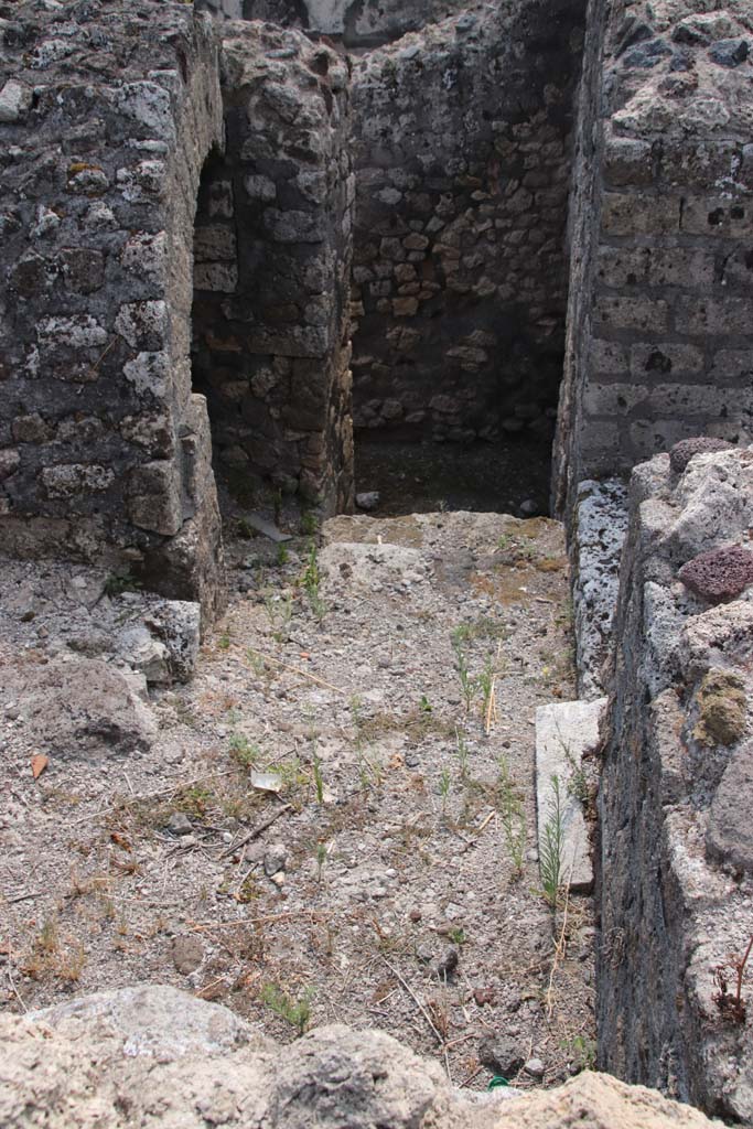 VI.17.10 Pompeii. September 2015. Looking south from entrance towards stairs to lower floor, (see VI.17.11).  The doorway on right, would lead to the south-east corner of the atrium. 

