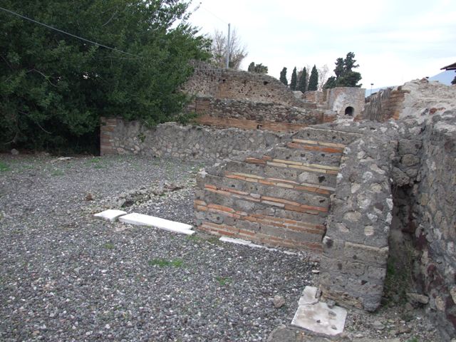 VI.17.10 Pompeii. September 2021. 
Area on north side of entrance doorway. Photo courtesy of Klaus Heese.
