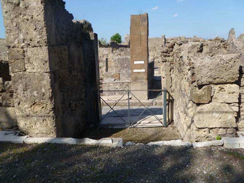 VI.17.17 Pompeii. May 2011. Looking east towards entrance doorway and steps down to Via Consolare.