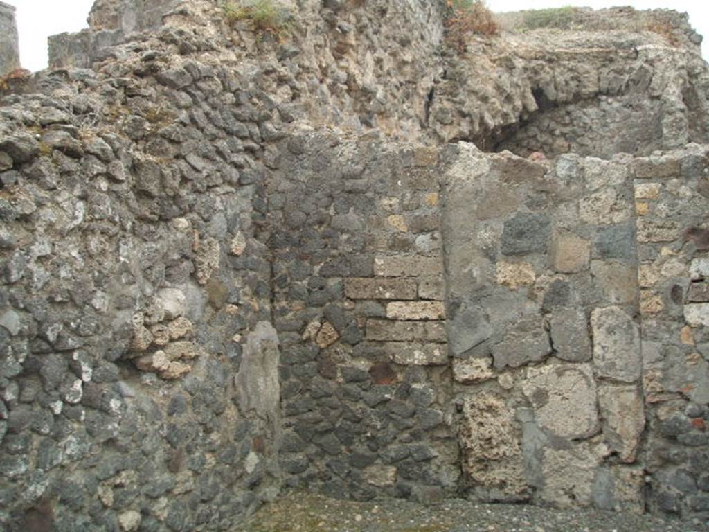 VI.17.33 Pompeii. May 2005. Blocked door in west wall.