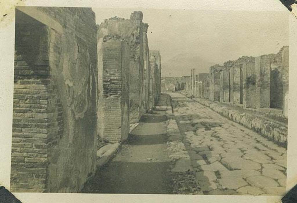 VI.17.35 Pompeii, on left. 29th March 1922. Looking north along pavement of Via Consolare.  Photo courtesy of Rick Bauer.
