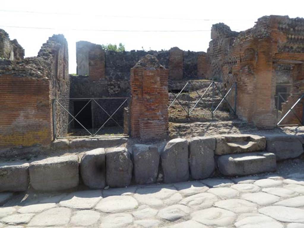 VI.17.37-36 Pompeii. May 2011. Looking west to entrance doorways on Via Consolare.
Photo courtesy of Michael Binns.
