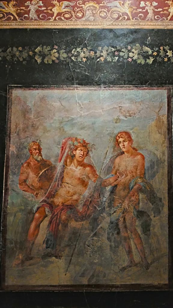 VI.17.42, Pompeii, May 2018. Triclinium 20, detail of Silenus, Dionysus and Ariadne from central painting on north wall. 
Photo courtesy of Buzz Ferebee.
