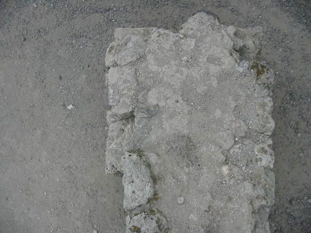 VII.1.1 Pompeii. May 2003. Remains of top of hearth at end of counter. Photo courtesy of Nicolas Monteix.
