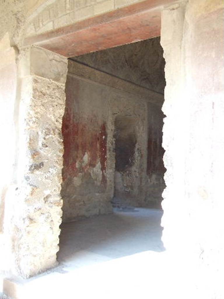 VII.1.8 Pompeii. June 2012. Doorway to vestibule 1, in east wall of portico B. Photo courtesy of Michael Binns.
