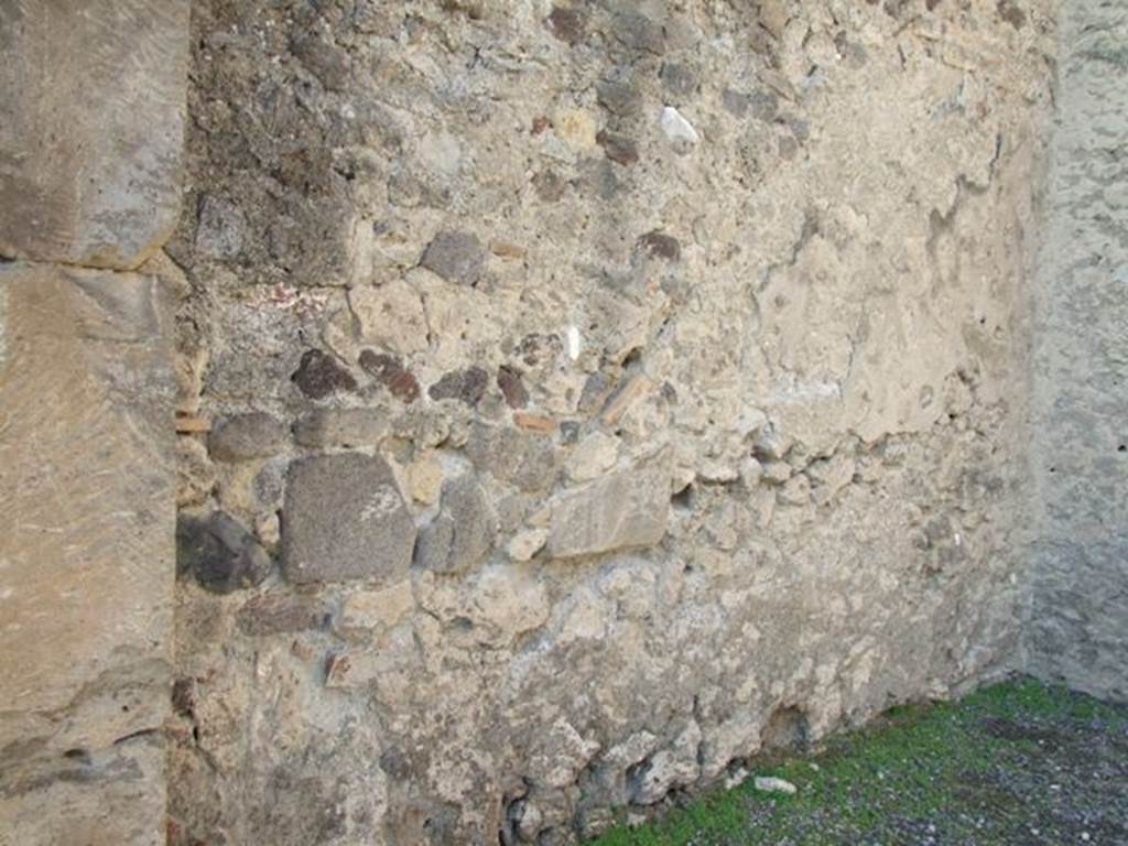 VII.1.11 Pompeii. December 2007. West wall with site of stairs to upper floor.
