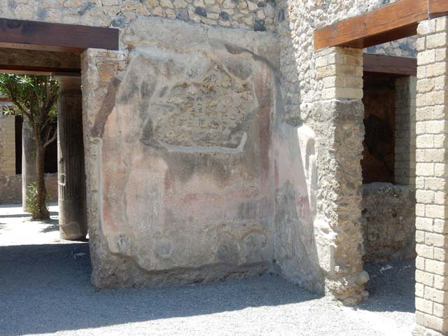 VII.1.25 Pompeii. May 2017. Remains of painted decoration in small room 28 in north-west corner of atrium, on west and north wall.  Photo courtesy of Buzz Ferebee.
