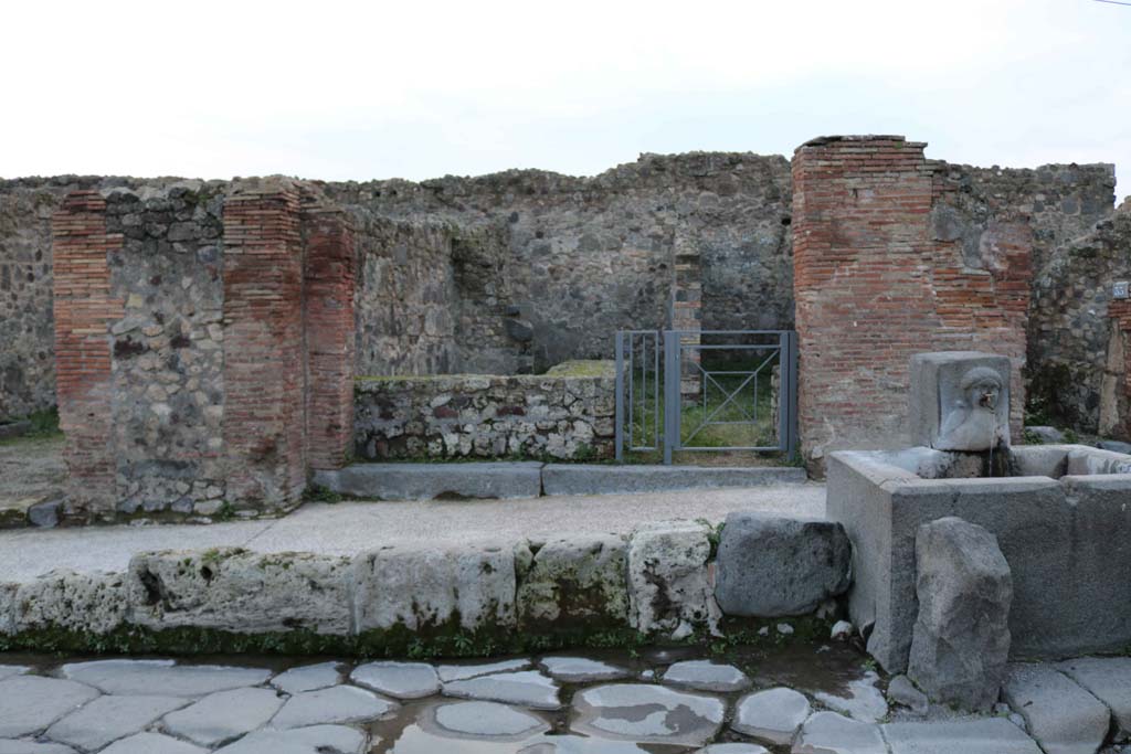 VII.1.32 Pompeii. December 2018. Entrance doorway on west side of Via Stabiana. Photo courtesy of Aude Durand.

