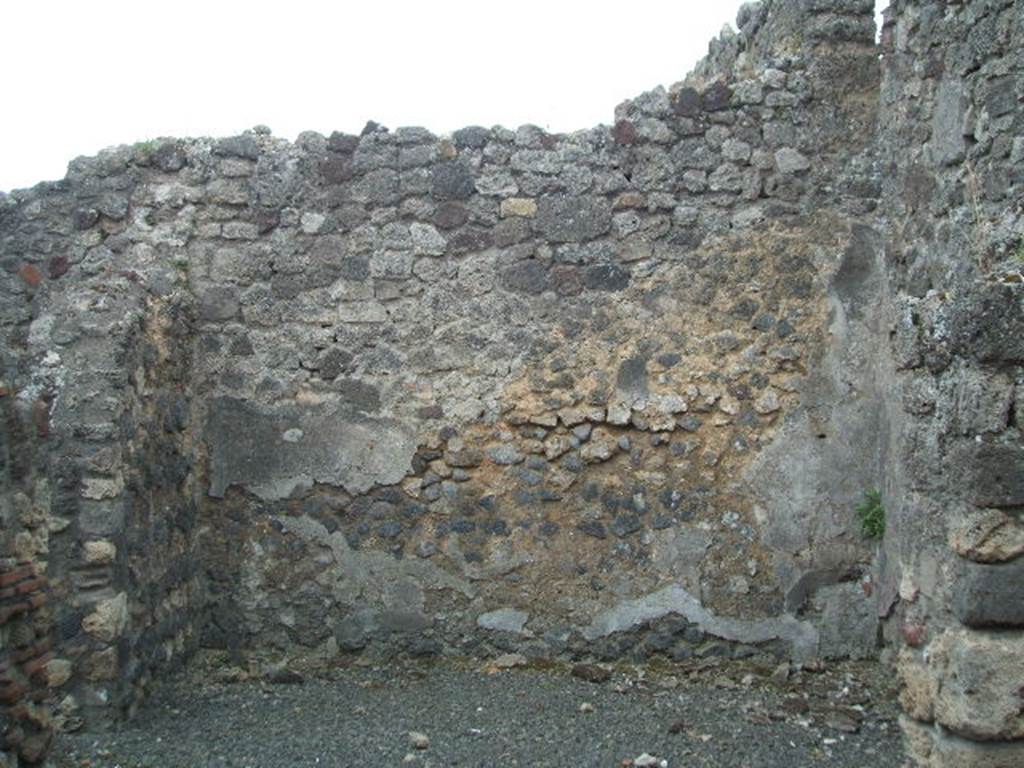 VII.1.35 Pompeii. May 2005. South wall of workshop, with doorway in east wall to VII.1.34.