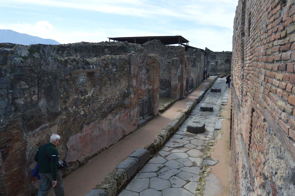 VII.1.36 Pompeii. March 2018. Looking west along south side of Via degli Augustali, with entrance doorway, in centre.
Foto Taylor Lauritsen, ERC Grant 681269 DÉCOR.
