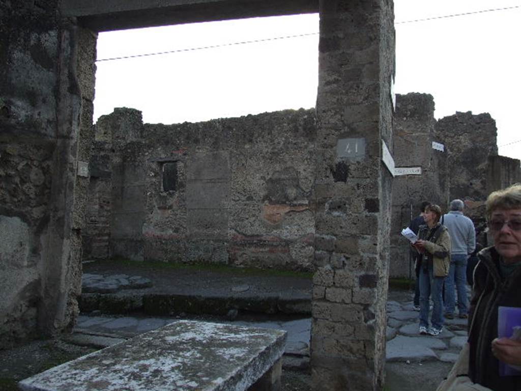 VII.1.41 Pompeii. December 2006. Looking west across shop to other entrance at VII.1.42.