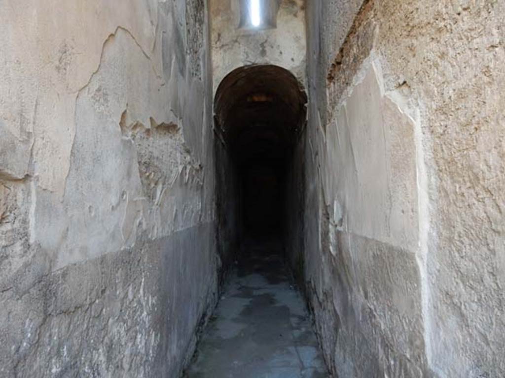 VII.1.48 Pompeii. May 2015. Looking east along corridor K. 
This leads to apodyterium (changing room) 11 of the women’s baths.
Photo courtesy of Buzz Ferebee.
