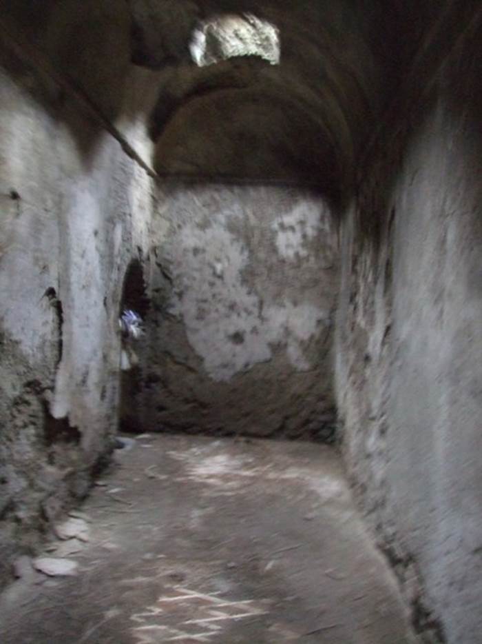VII.1.48 Pompeii. December 2007. Shorter length of corridor K looking south to entrance to women’s changing room 11.