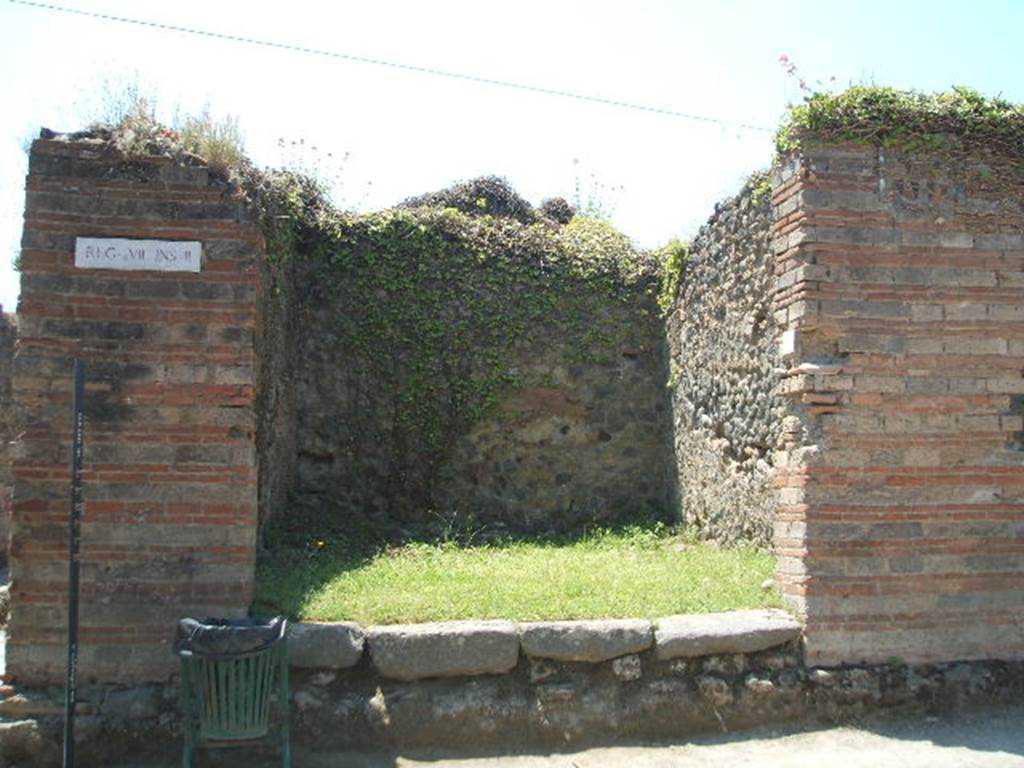 VII.2.1 Pompeii. May 2005. Small shop, on the left would have been the steps to upper floor. On the right, the north wall collapsed due to heavy rain on 1st December 2010.