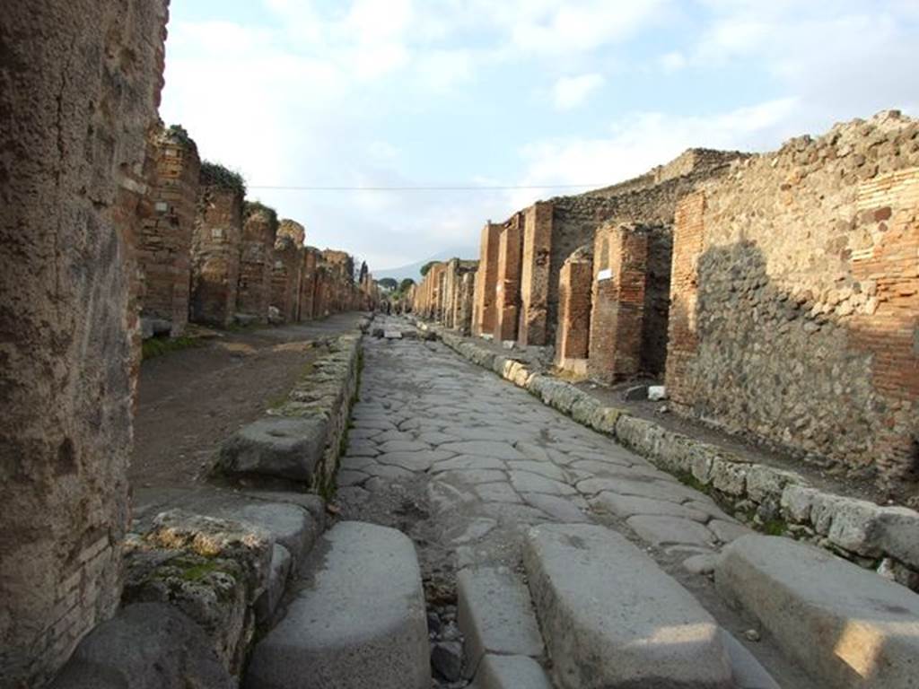 Pompeii. March 2009. Looking north on Via Stabiana outside VII.2.1 with wall of water tower on left.

