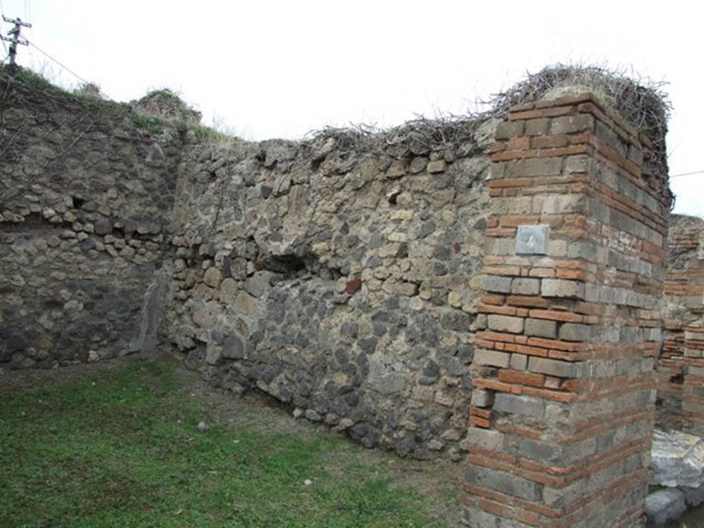 VII.2.4 Pompeii. December 2007. North wall and north-west corner.
Eschebach said there were steps to the upper floor at the rear on the right.
