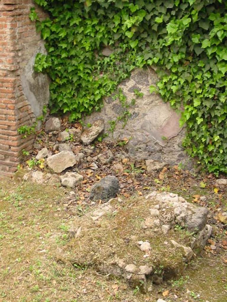 VII.2.12 Pompeii. May 2003. Remains of podium near south-east corner. Photo courtesy of Nicolas Monteix.