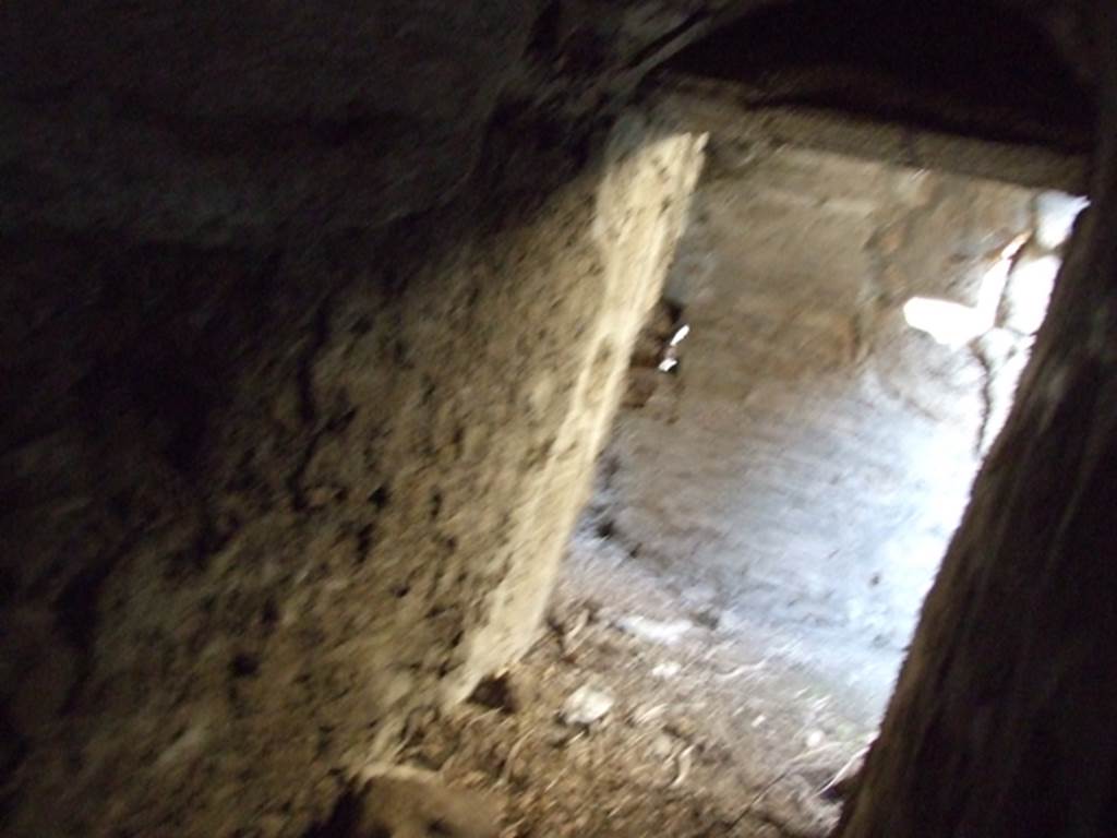 VII.2.14 Pompeii.  March 2009. Underground cellars at entrance to two rooms on north side of corridor.