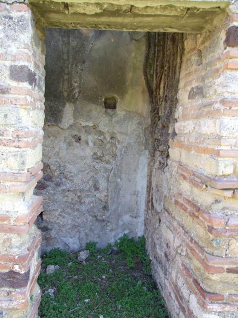 VII.2.18 Pompeii. March 2009.Second doorway to room 12, cupboard.