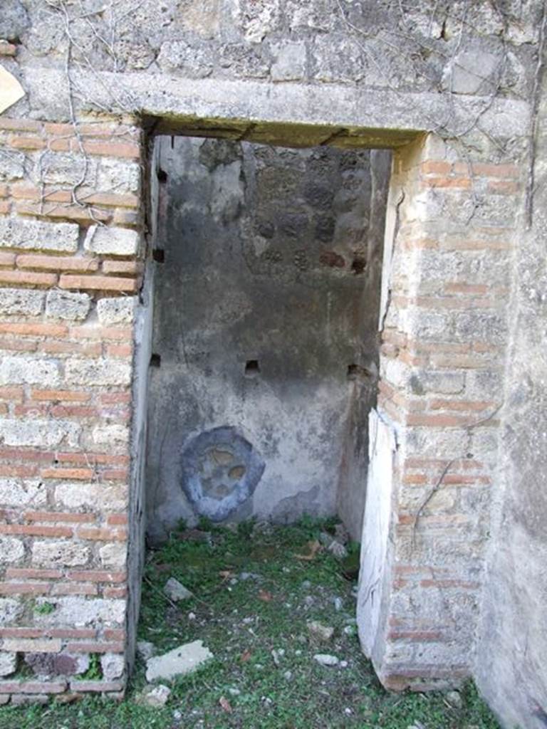 VII.2.18 Pompeii.  March 2009. Doorway to Room 15. Cupboard.