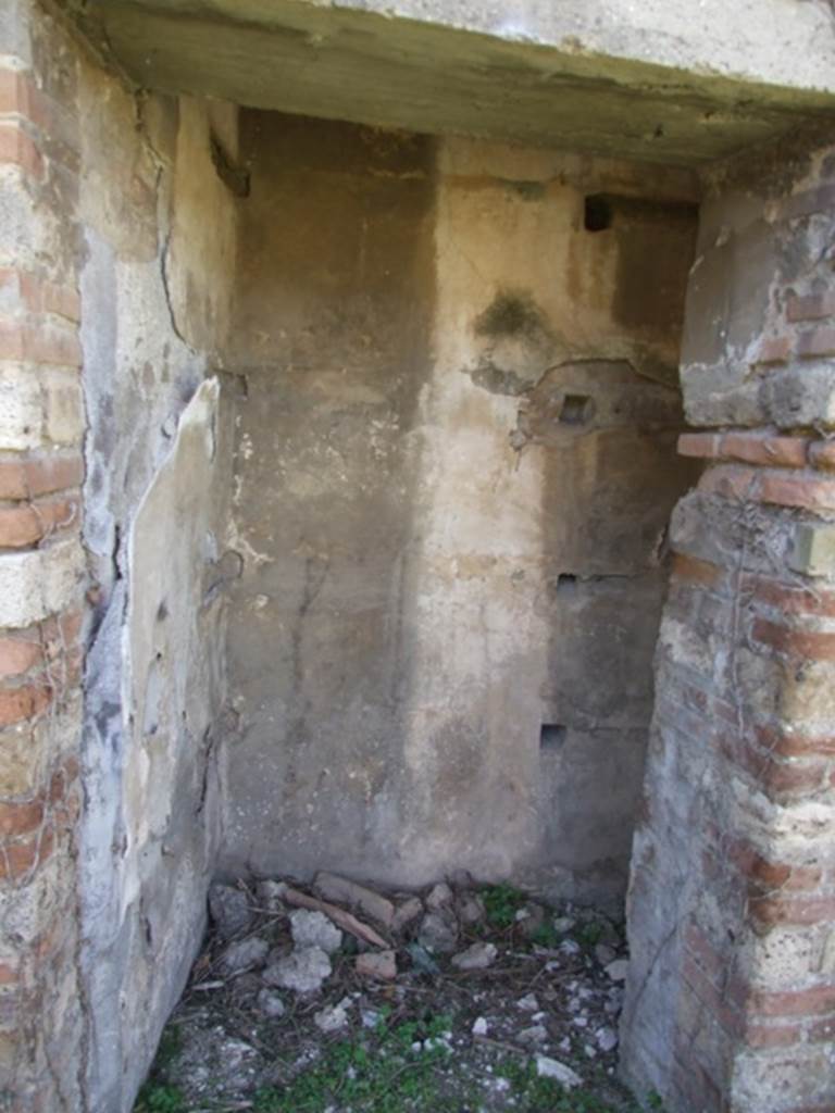 VII.2.18 Pompeii. March 2009. Room 16, south wall of small room or cupboard, with shelving supports. 