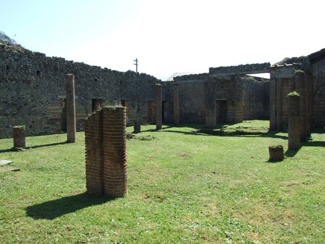 VII.2.18 Pompeii. March 2009. Looking south-east from north portico across peristyle garden.