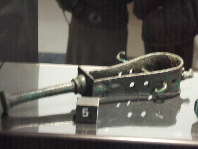 Bronze sistrum found in VII.2.18.  Now in Naples Archaeological Museum.