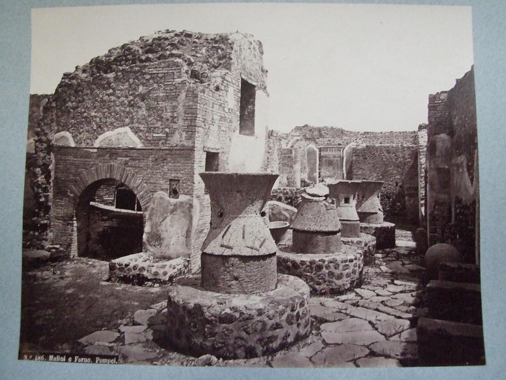 VII.2.22 Pompeii. 1944. Looking towards oven and mills in bakery. Photo courtesy of Rick Bauer.
(This photo was in an album belonging to a “sailor” assigned to Patrol Squadron 63 (VP-63).) 

